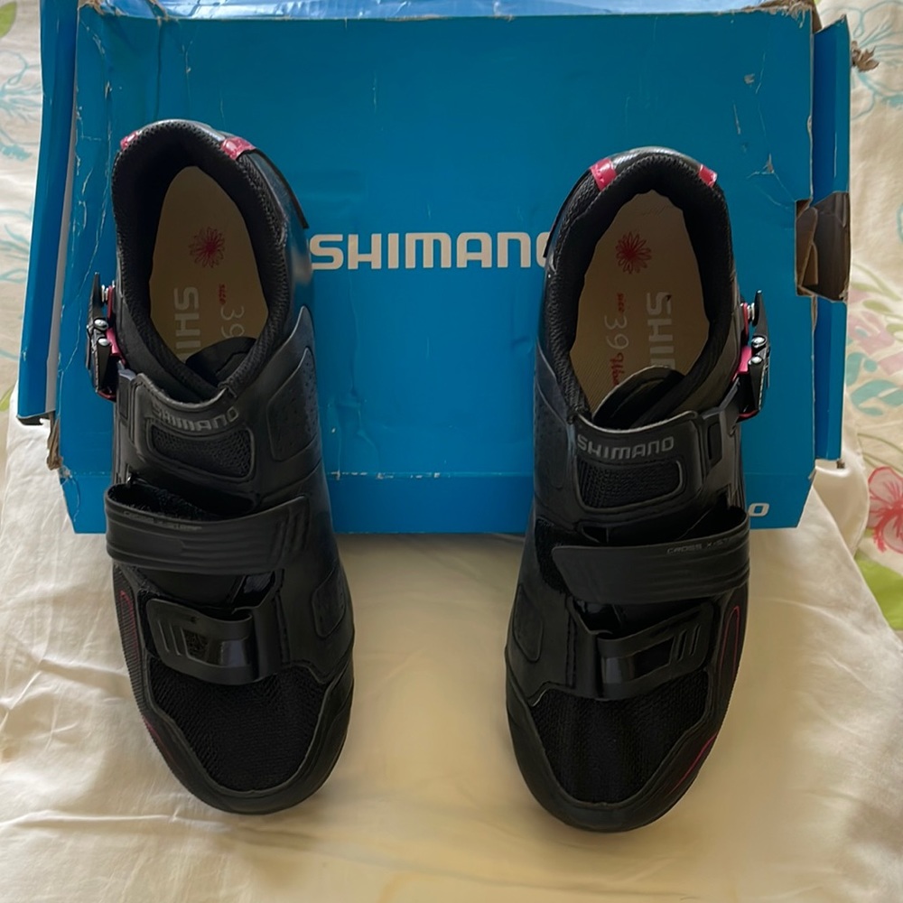 Shimano. black clip in stationary bike shoes